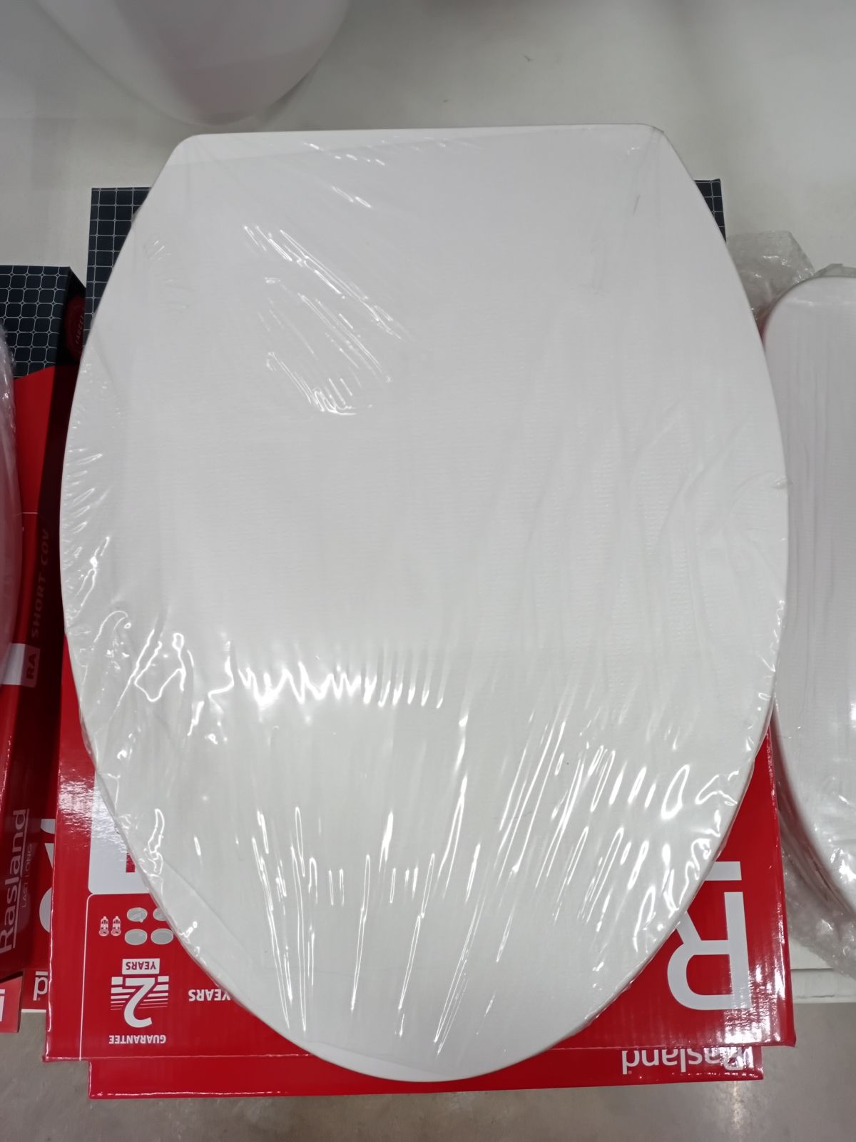 ฝารองนั่งพร้อมน็อตยึด แบบหน้ายาว Rasland RA SEAT-ELG