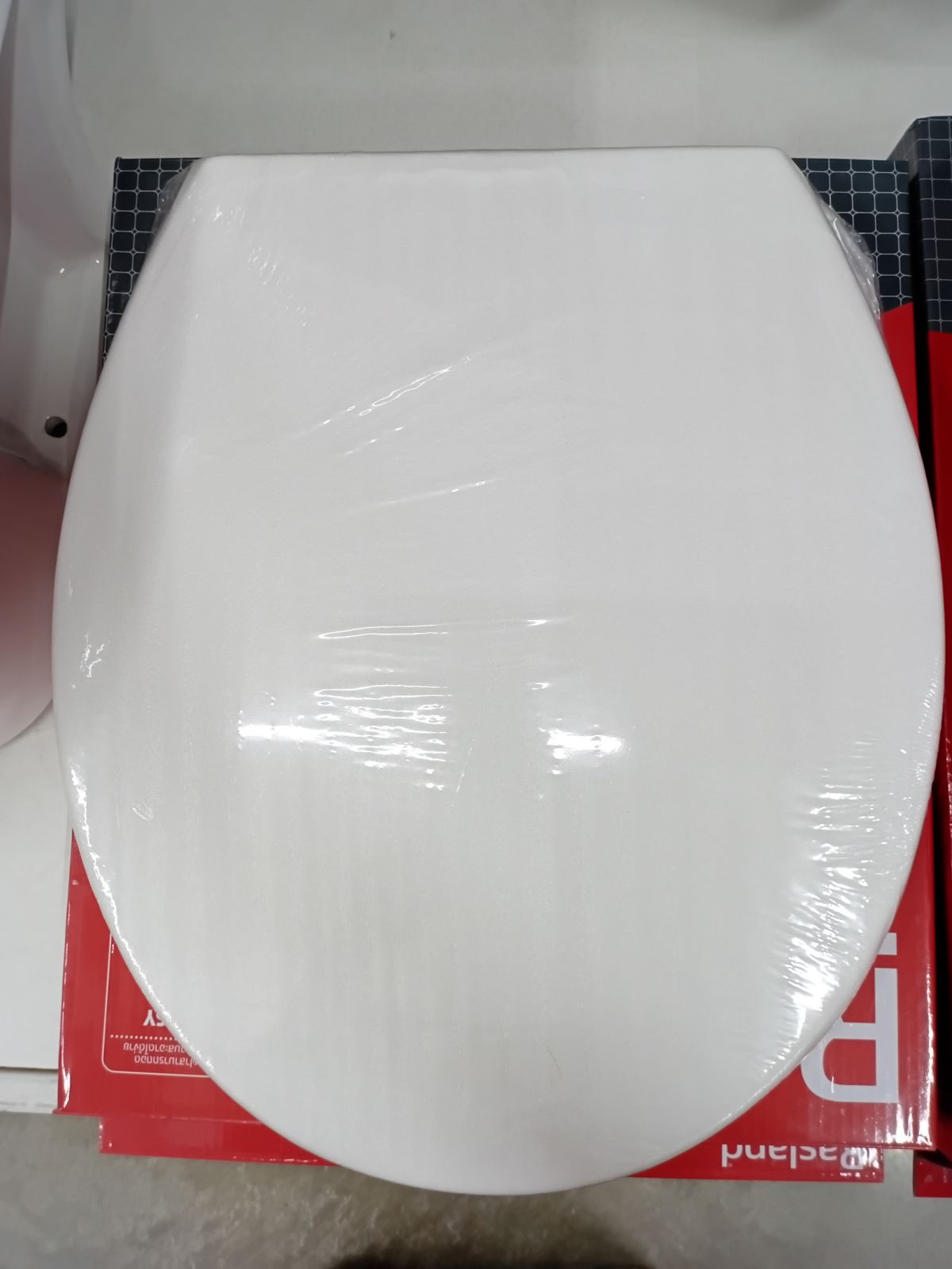 ฝารองนั่งพร้อมน็อตยึด แบบหน้าสั้น RA SHORT-COV RASLAND