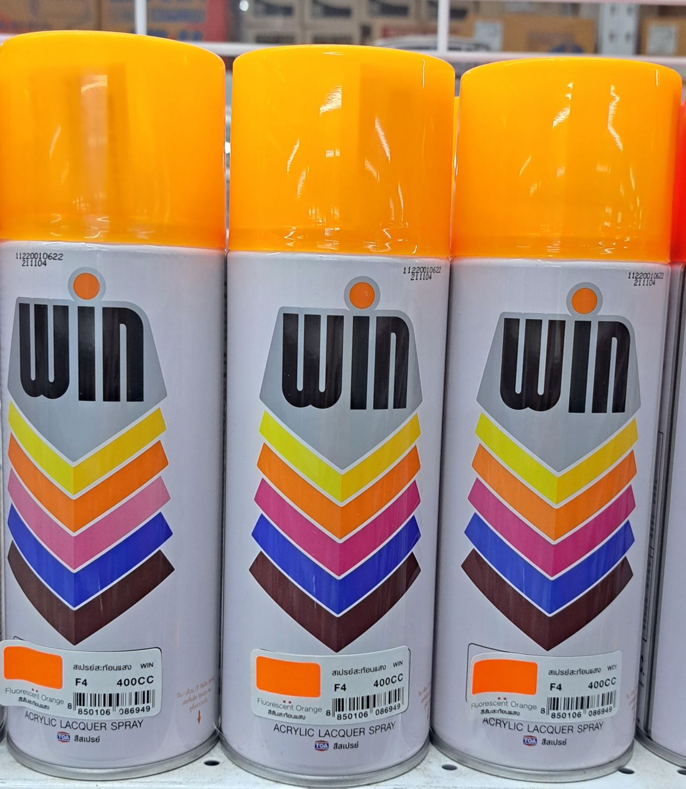 สีสเปรย์ WIN สีส้มสะท้อนแสง F4