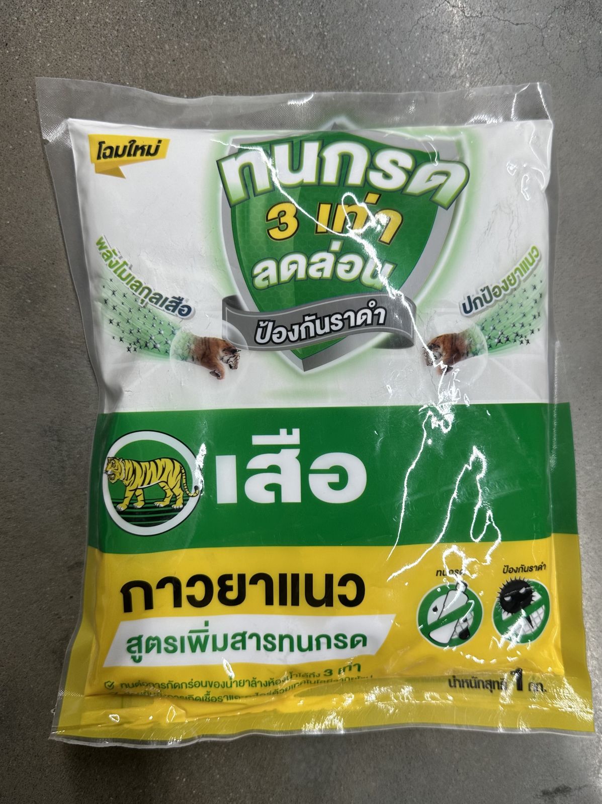 กาวยาแนวทนกรด เสือคู่ 01 สีขาวงาช้าง