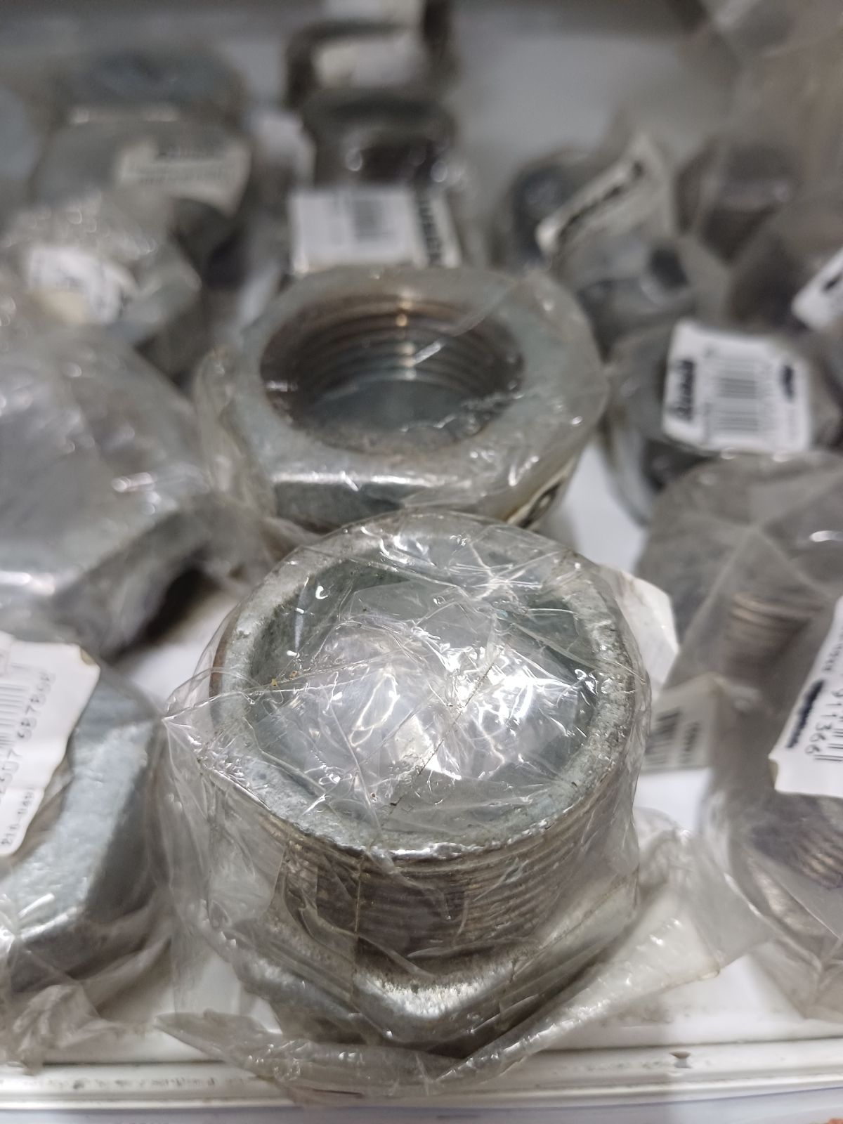 ข้อลดเหลี่ยม 1.1/4"-1" เหล็ก